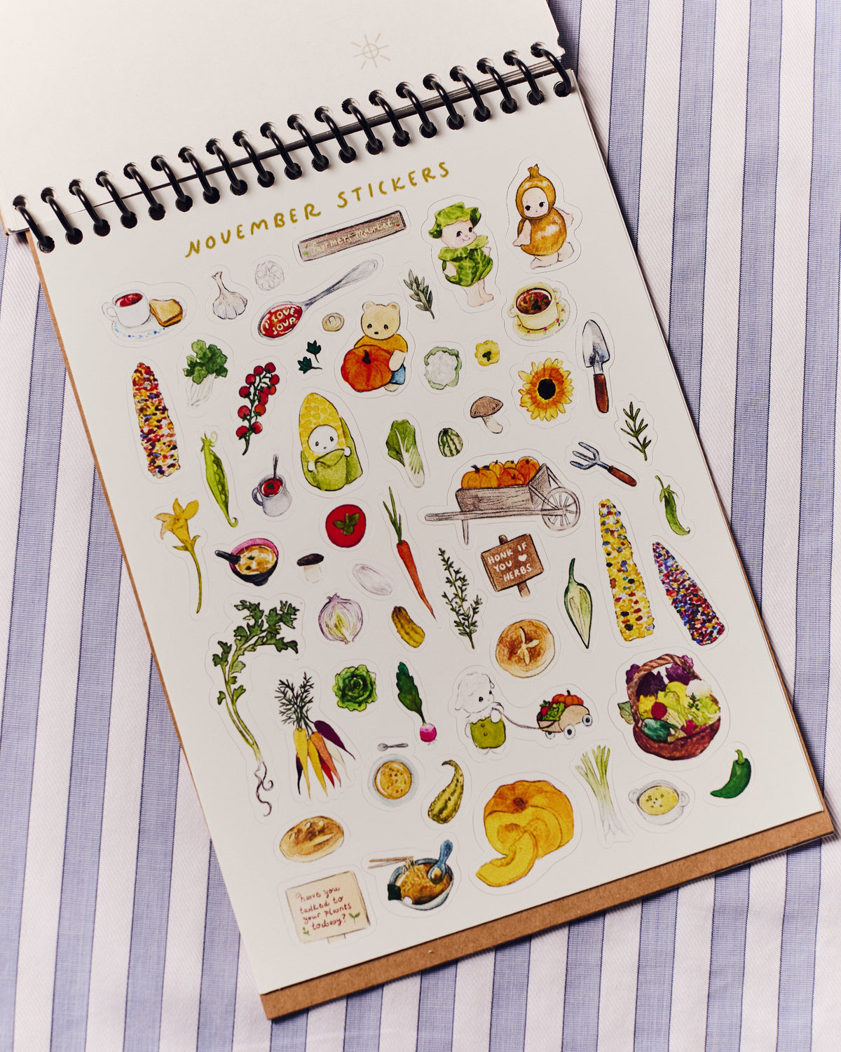 November stickers sheet with various illustrations on a striped background