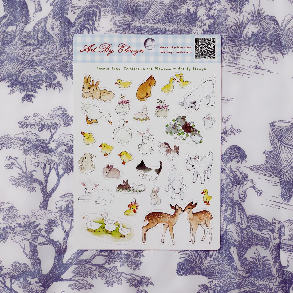 Sheet of animal stickers on a decorative paper background