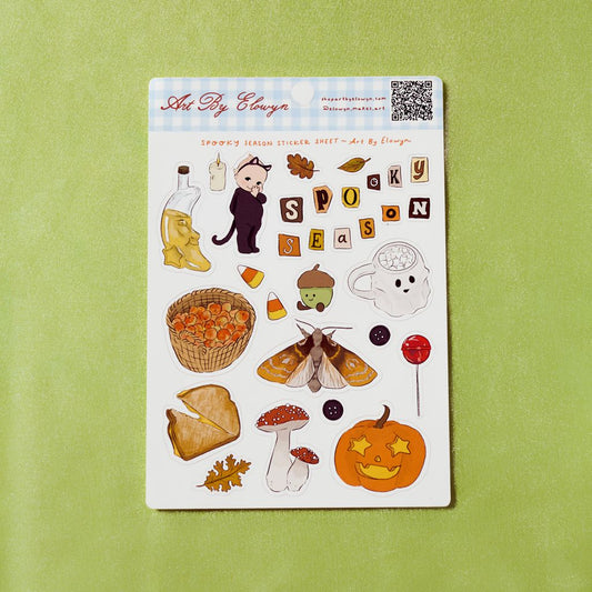 Halloween-themed sticker sheet with various illustrations on a green background