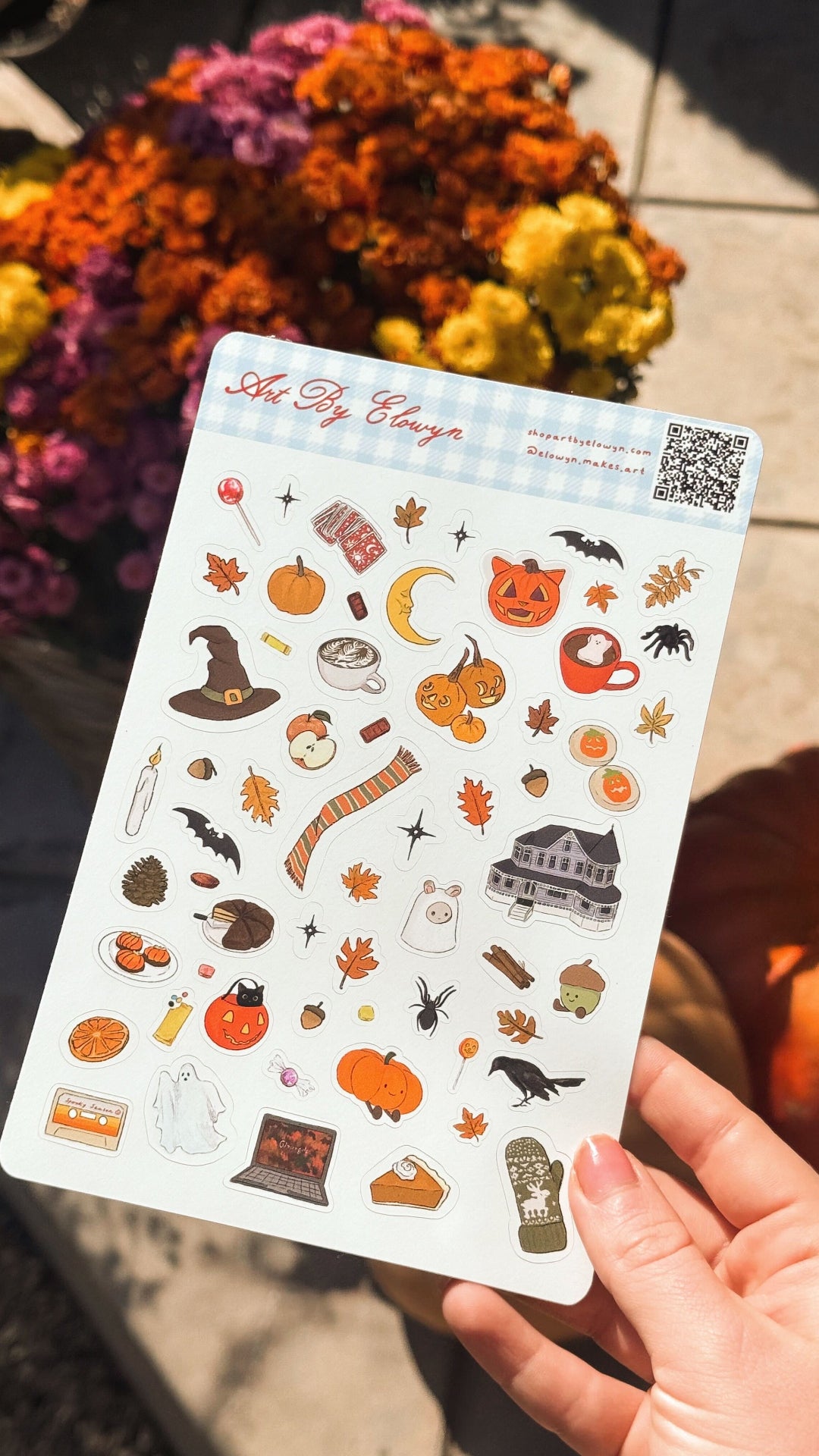 A product photo of Art By Elowyn's Teenie Tiny Halloween Sheet in natural lighting outside.