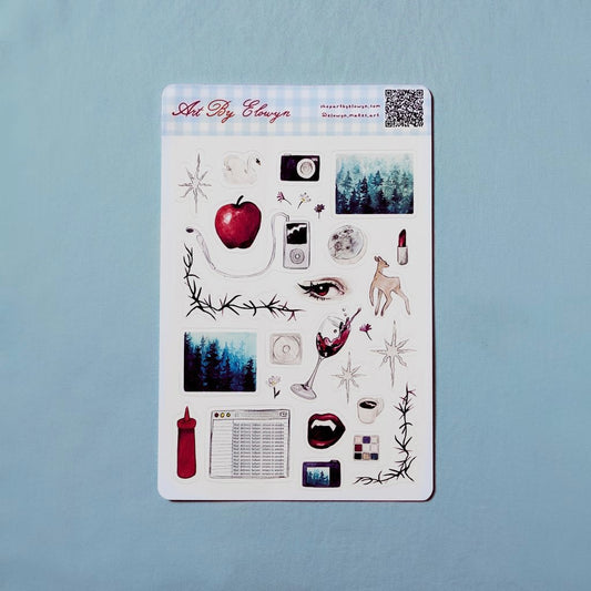 Sheet of decorative stickers with various designs on a light blue background